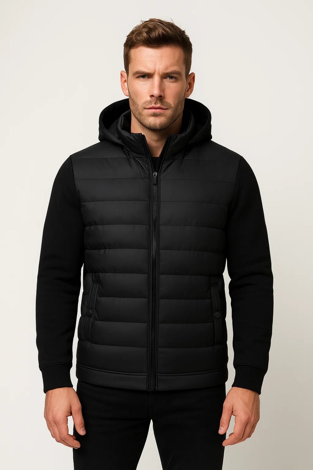Men's black hooded puffer jacket with quilted panels and zip fastening