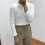 Men's ribbed long-sleeve polo sweater with collared neckline and button placket