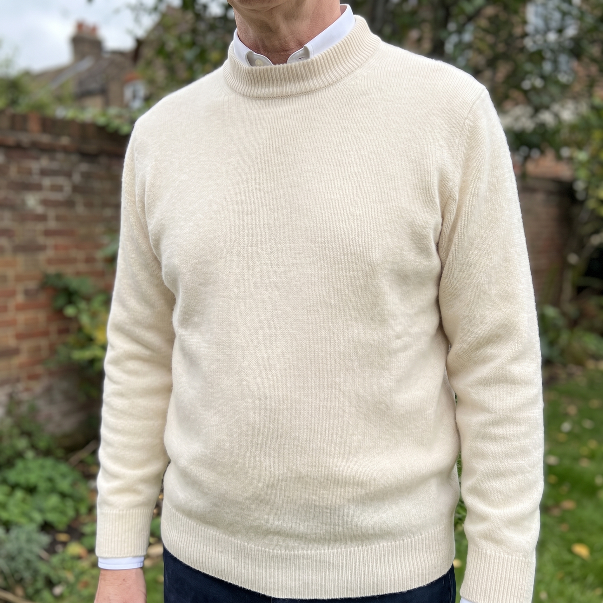 Unisex mock neck knit sweater with long sleeves and ribbed trims