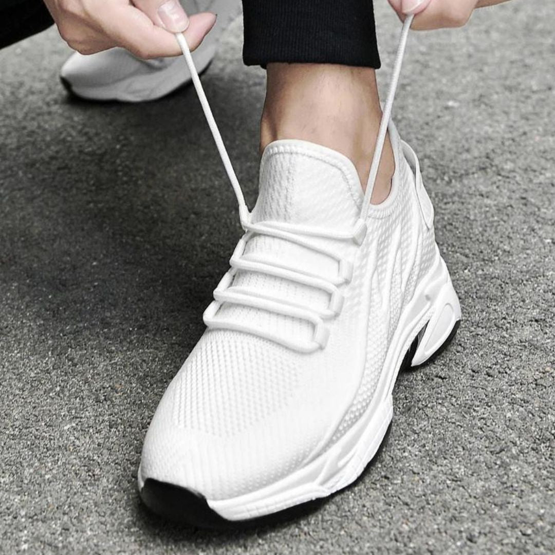 Men's lace-up trainers with a raised sole and panelled upper