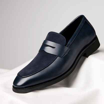 Men's navy and black penny loafers with almond toes and low heels