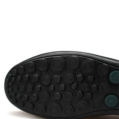 Men's slip-on loafer with moccasin stitching, perforated detail and textured flat sole