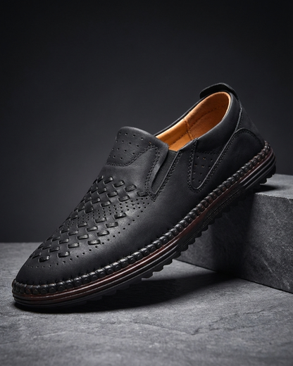 Perforated slip-on loafers with stitched sole trim and ridged tread