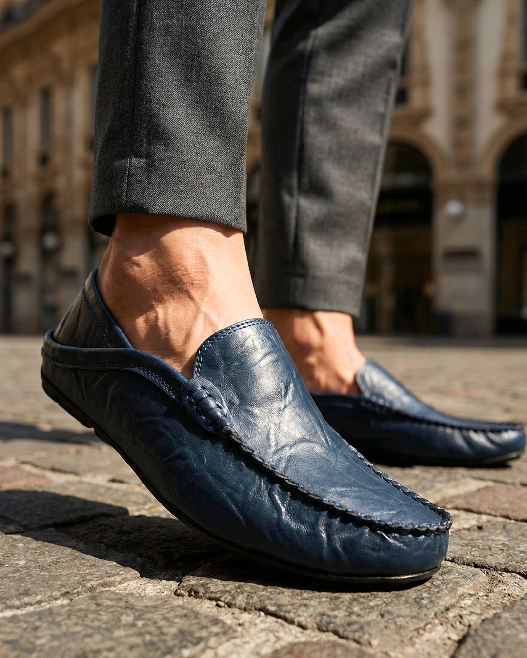 Unisex moc toe loafers with braided side trim and flat dark soles