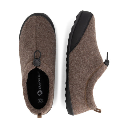 Brown house slippers with black toe panels, toggle closures and flat textured soles