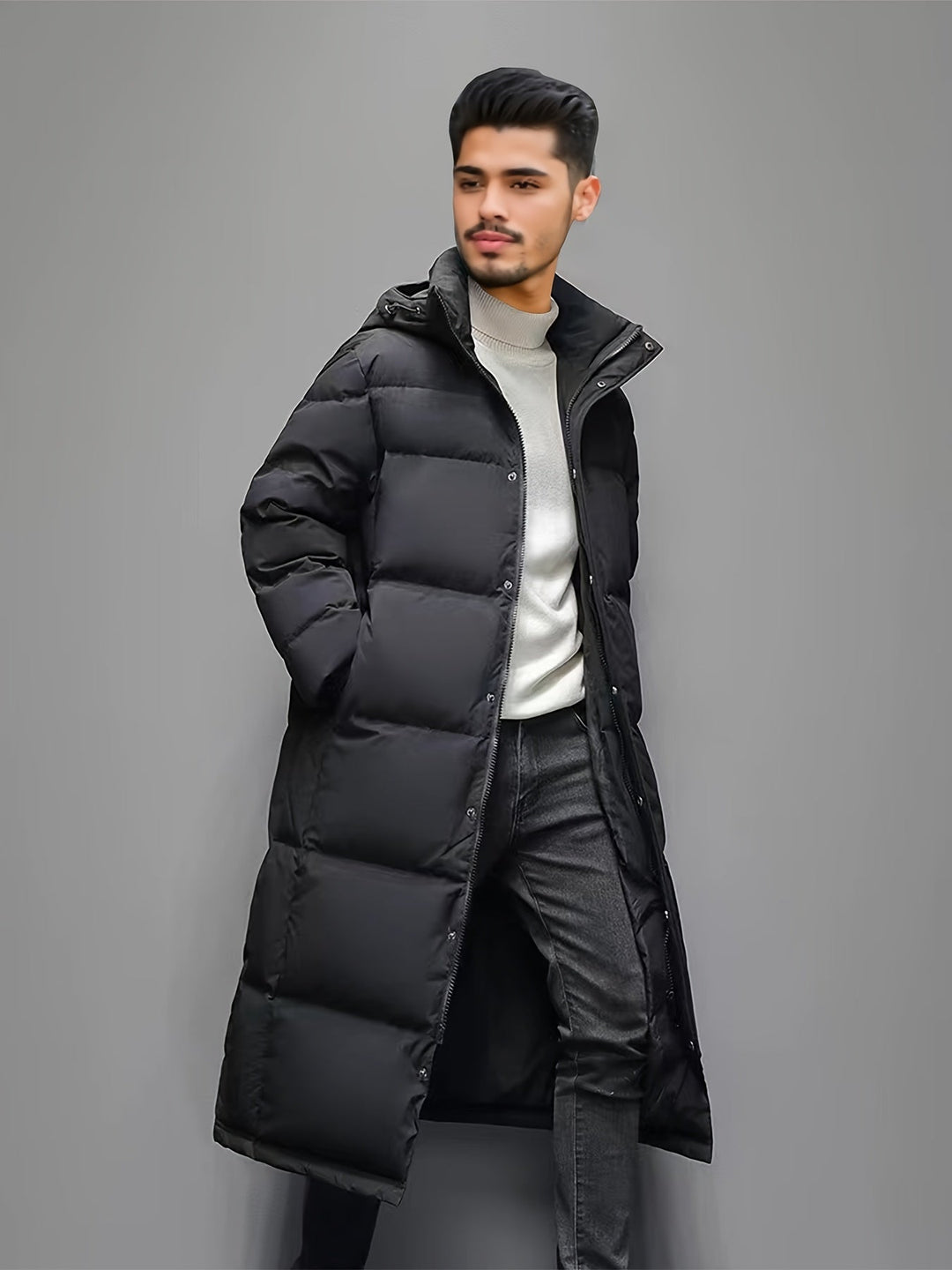 Men's black long hooded puffer coat with quilted panels
