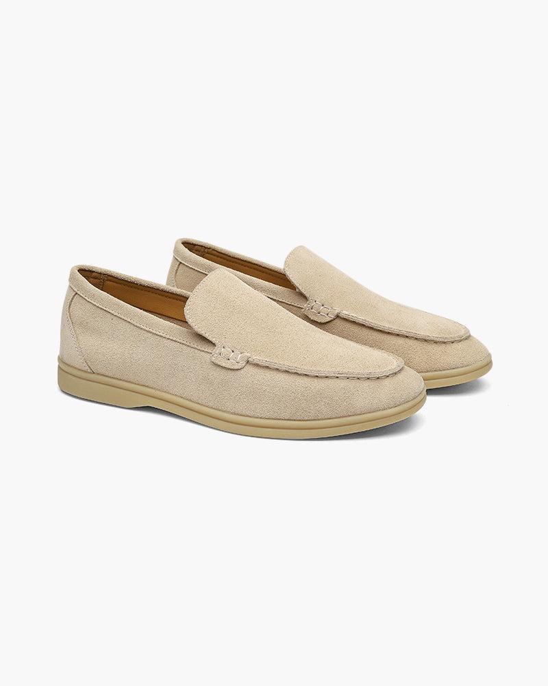 Unisex slip-on loafers with moccasin stitching and low heels