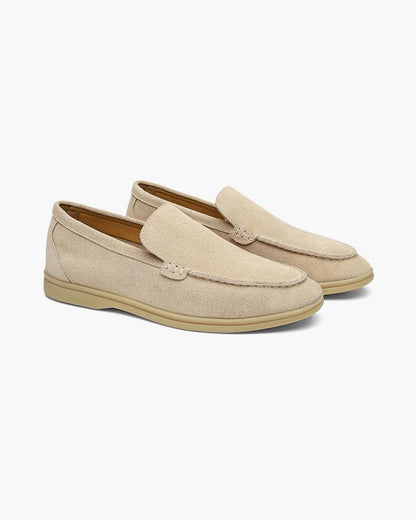 Unisex slip-on loafers with moccasin stitching and low heels
