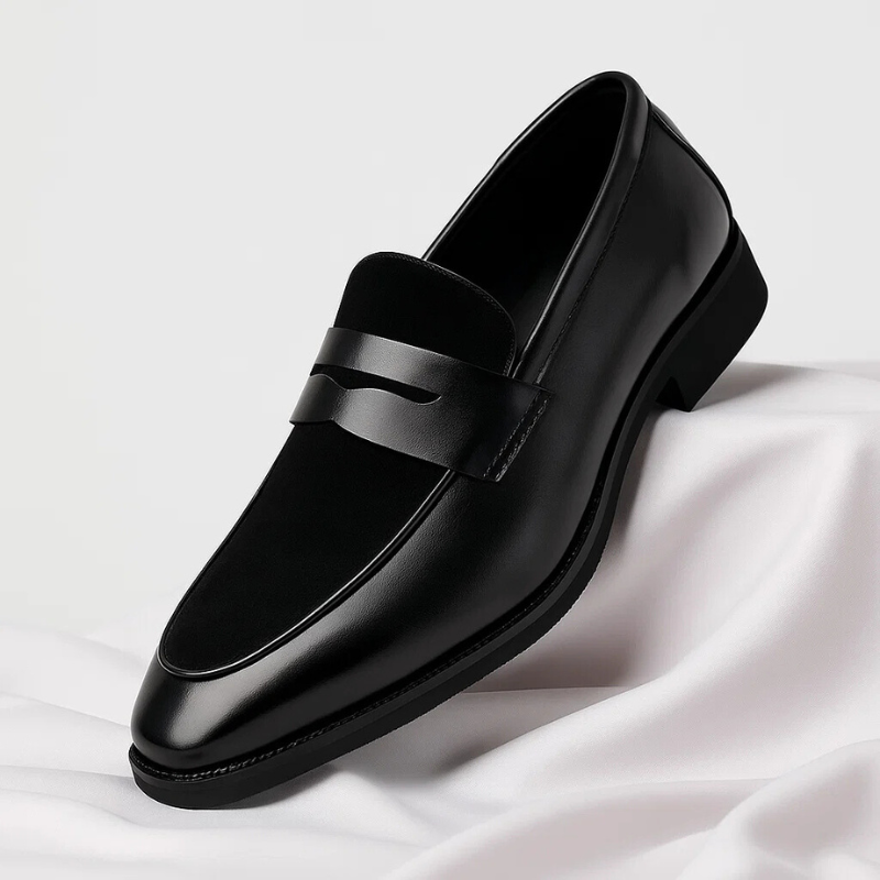 Men's navy and black penny loafers with almond toes and low heels