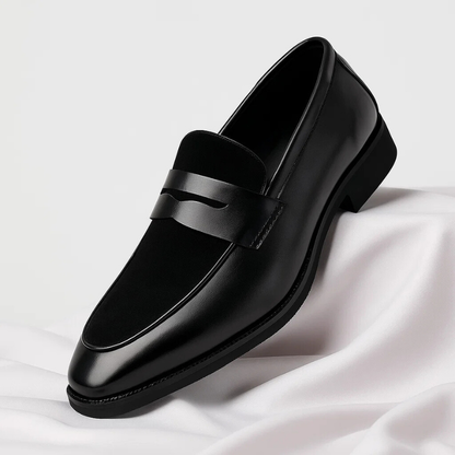 Men's navy and black penny loafers with almond toes and low heels