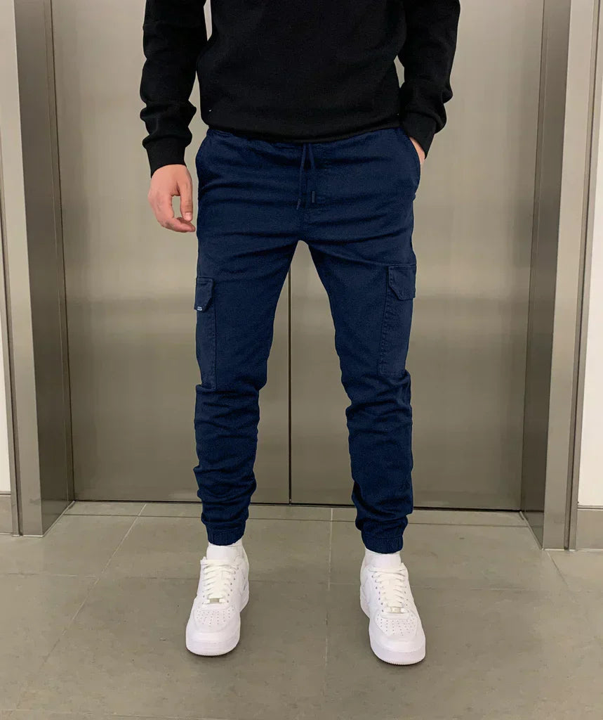 Men's tapered cargo trousers with drawstring waist, thigh pockets and elasticated cuffs