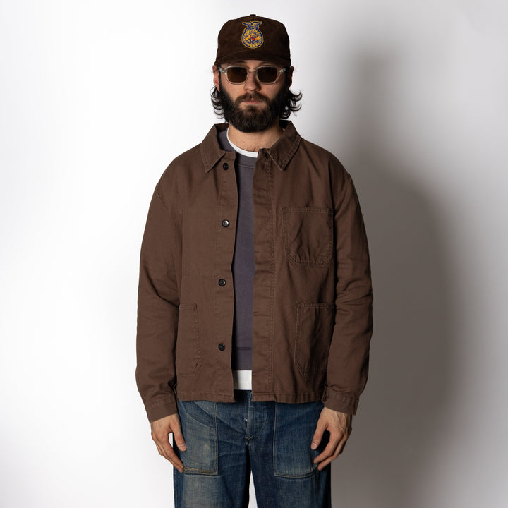 Men's brown utility jacket with four patch pockets