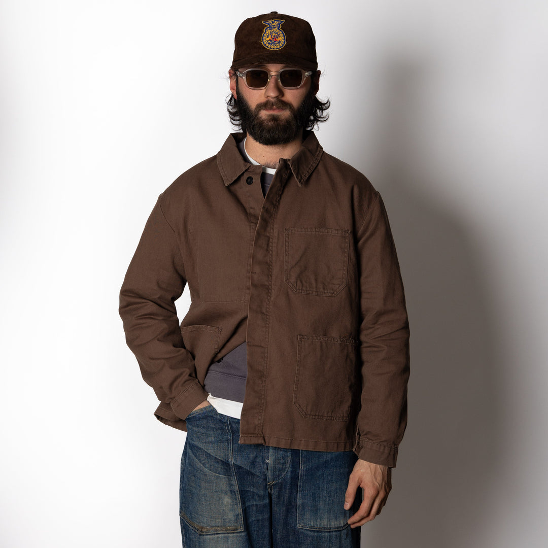 Men's brown utility jacket with four patch pockets