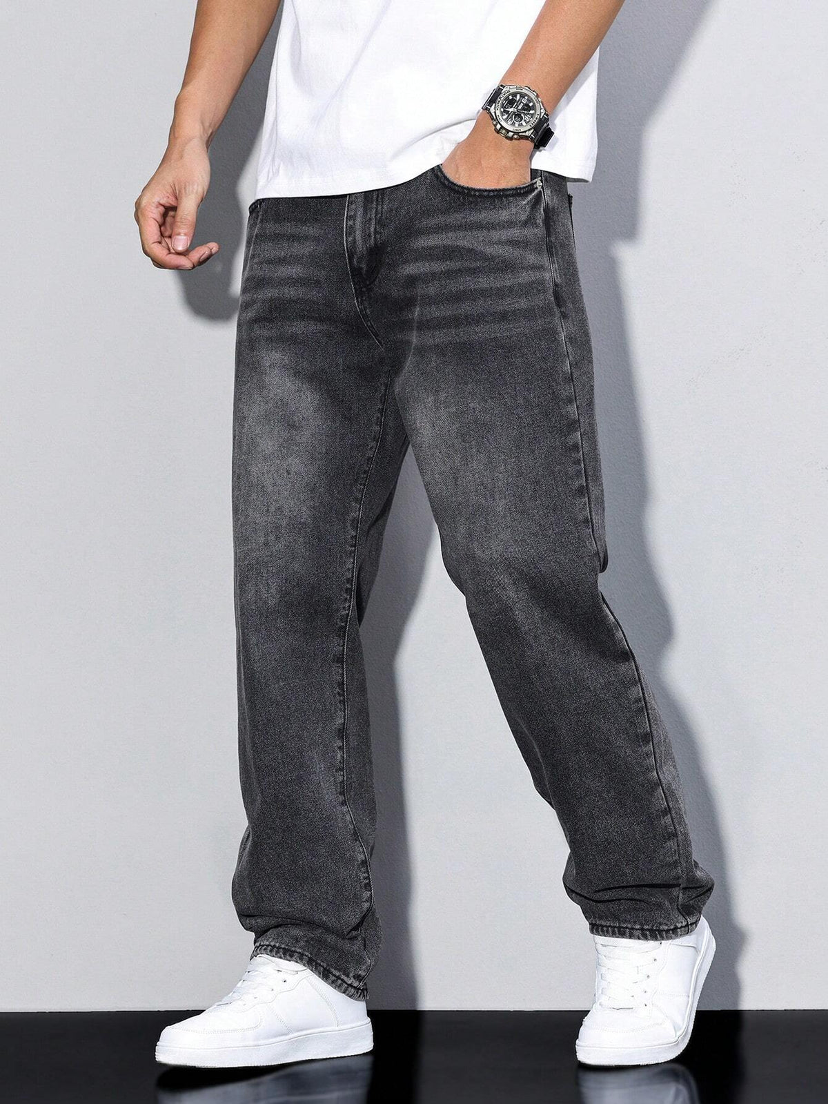 Men's loose straight leg jeans shown in grey and blue denim washes