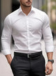 Men's slim fit button-up shirt with long sleeves and front buttons