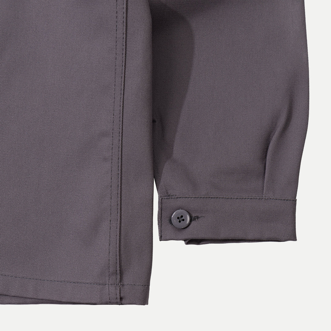 Men's gray utility jacket with collar and multiple patch pockets
