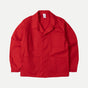 Men's red long-sleeve chore jacket with button front and three patch pockets