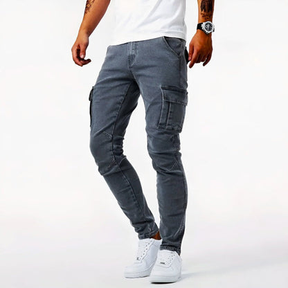 Men's grey slim fit cargo jeans with tapered legs and side pockets