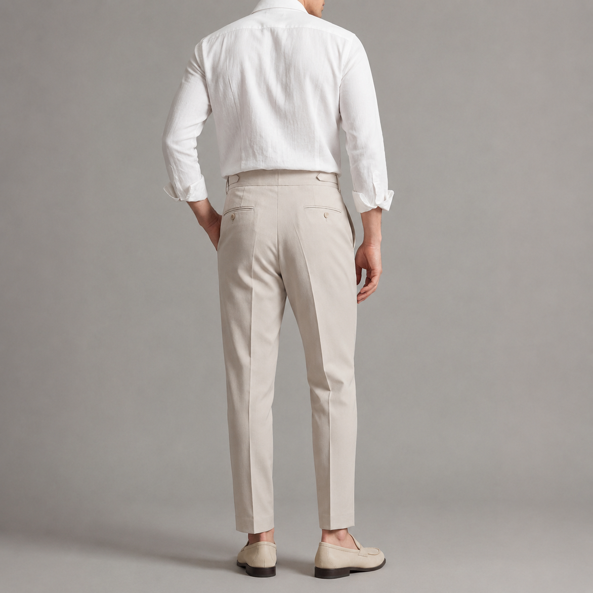 Men's tailored trousers with pleated front, buckle waist and straight full-length legs