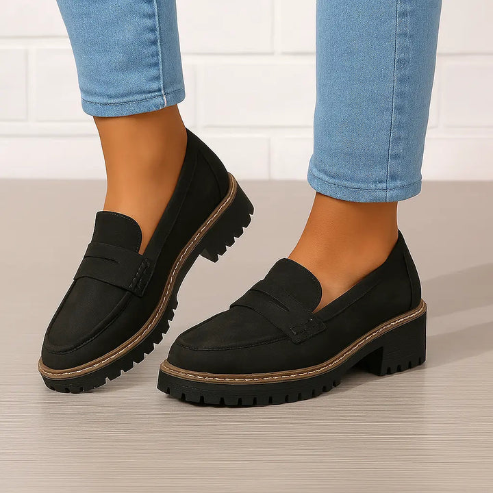 Unisex penny loafers with moc toe and chunky lug sole