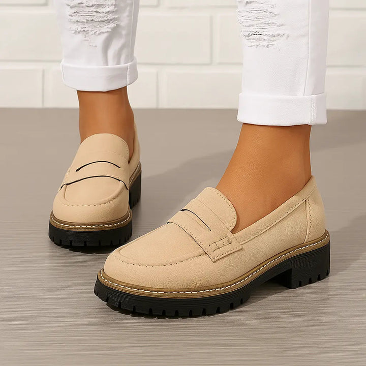 Unisex penny loafers with moc toe and chunky lug sole