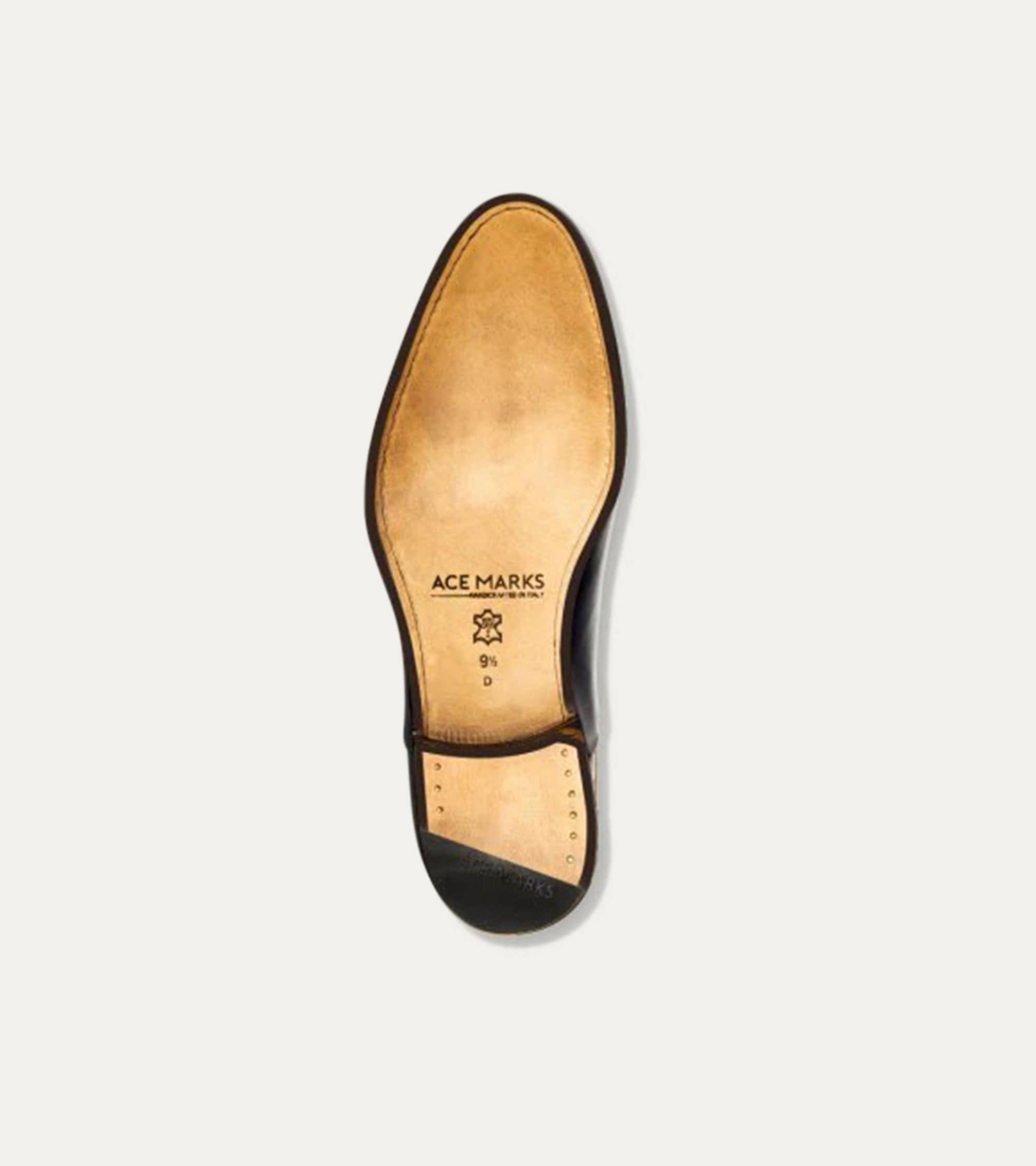 Black Chelsea boot with rounded toe and elastic side panels