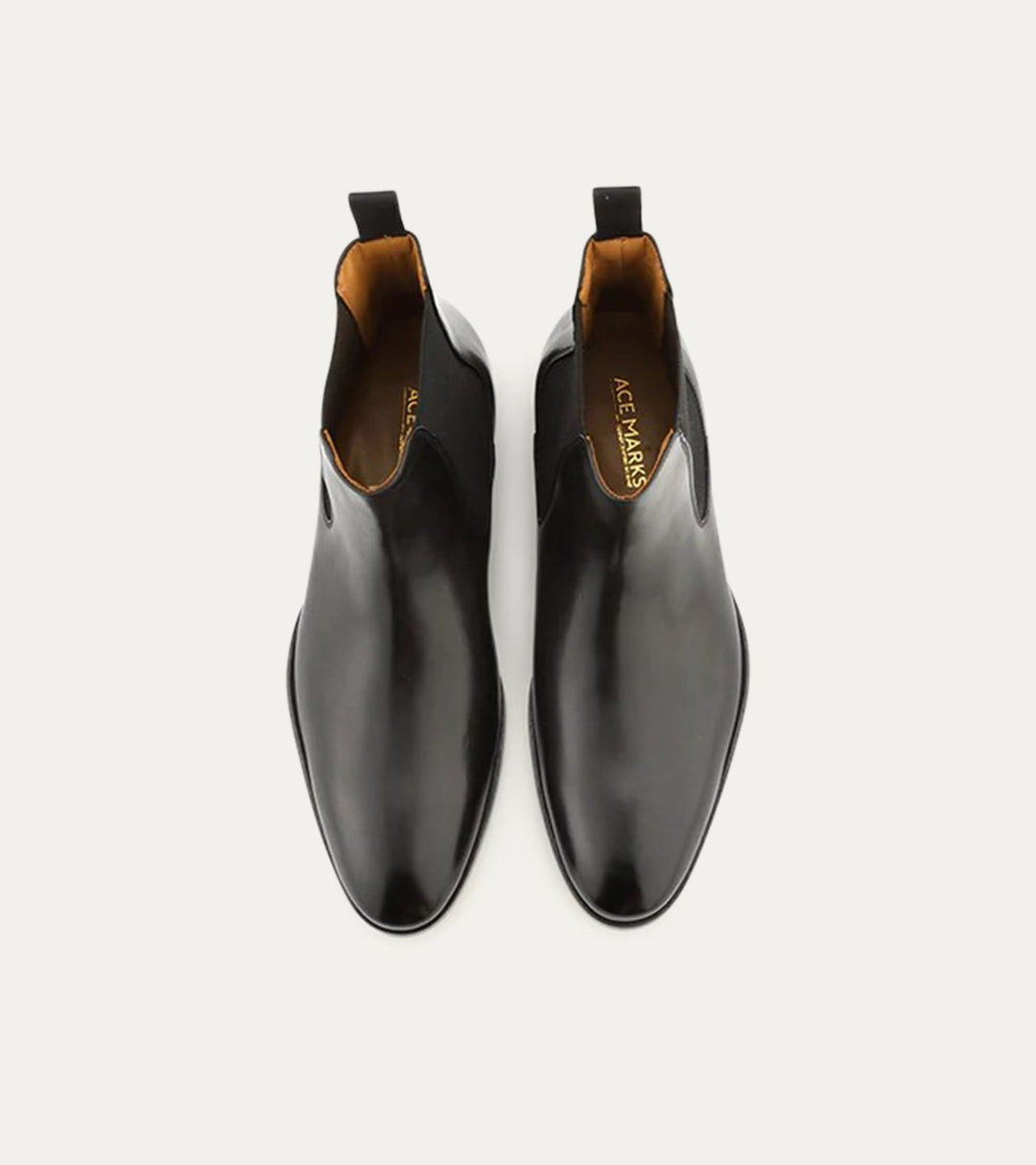 Black Chelsea boot with rounded toe and elastic side panels