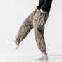 Men's fleece jogger trousers with contrast side stripes and elasticated cuffs