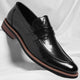 Men's penny loafer with polished finish, round toe and low heel