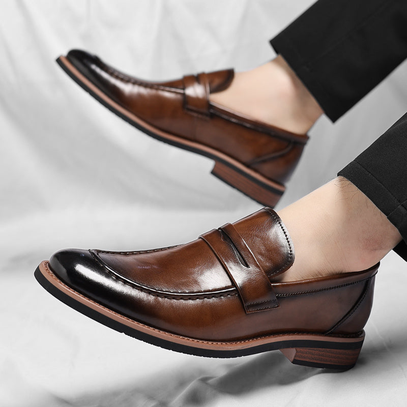 Men's penny loafer with polished finish, round toe and low heel