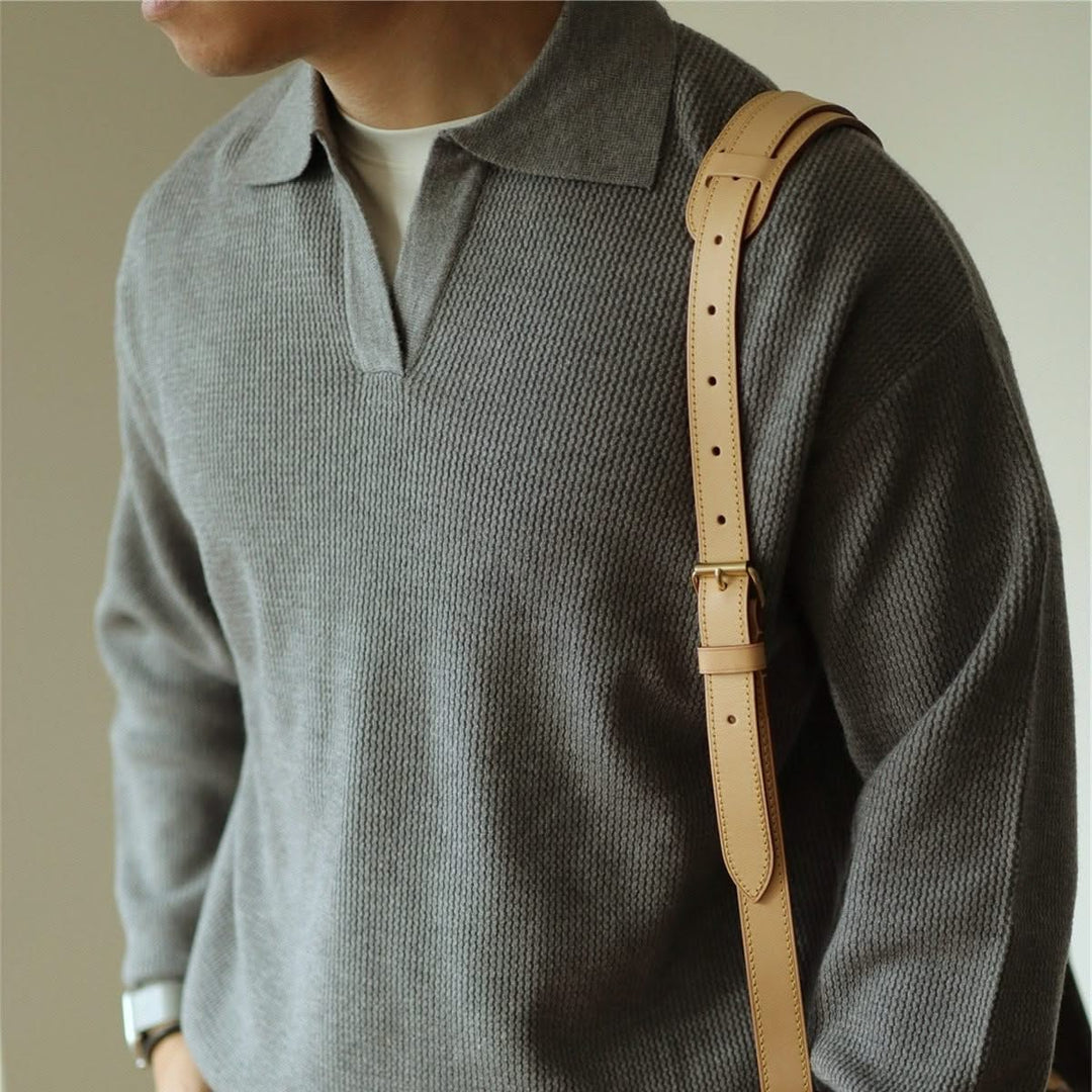 Men's long sleeve textured knit polo shirt with a collared neckline