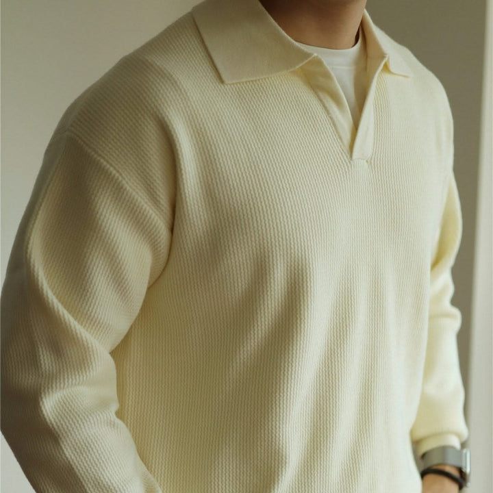 Men's long sleeve textured knit polo shirt with a collared neckline