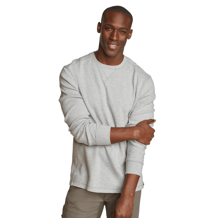 Men's crew neck long sleeve top with fine ribbed texture and ribbed cuffs