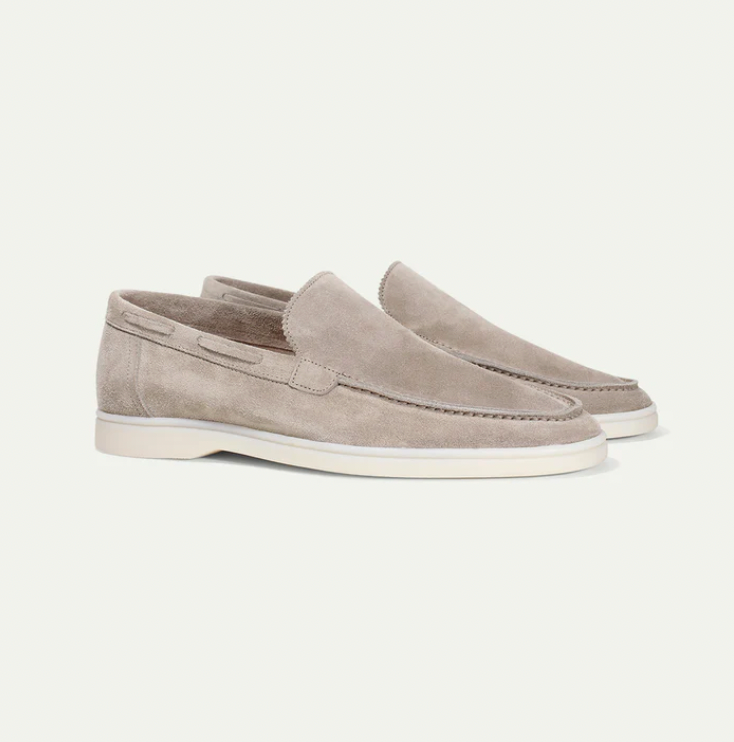 Men's slip-on loafers with moc-toe stitching and flat soles
