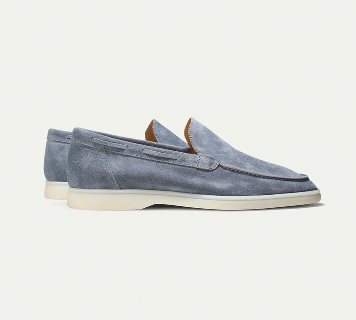 Men's slip-on loafers with moc-toe stitching and flat soles