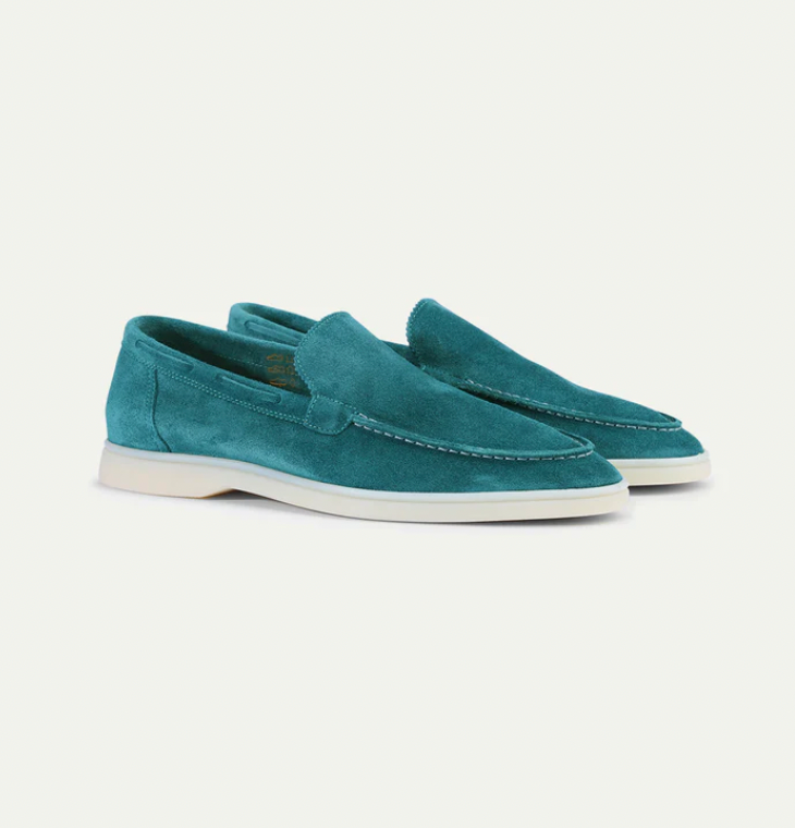 Men's slip-on loafers with moc-toe stitching and flat soles