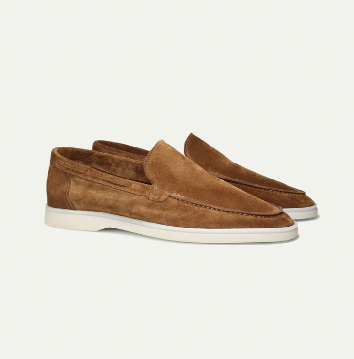 Men's slip-on loafers with moc-toe stitching and flat soles