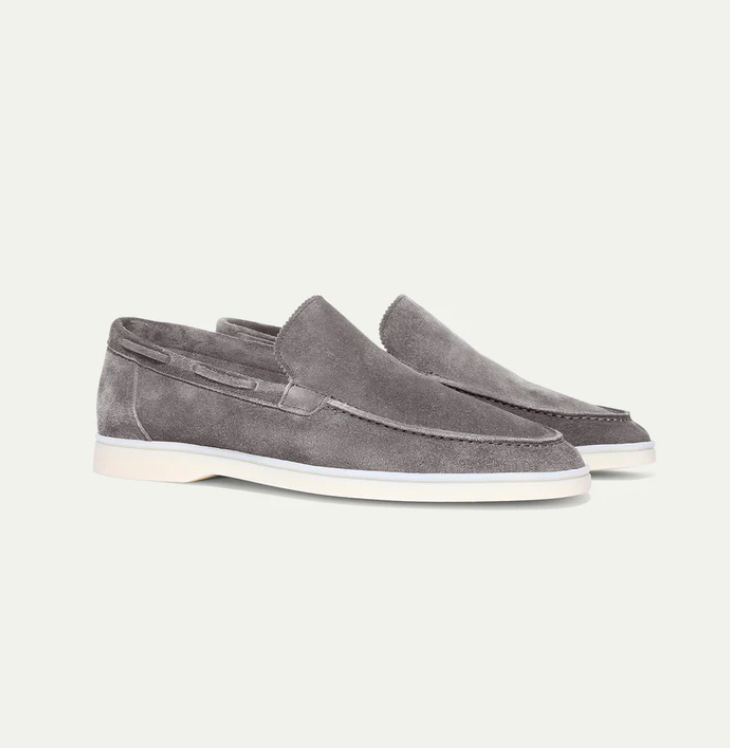 Men's slip-on loafers with moc-toe stitching and flat soles