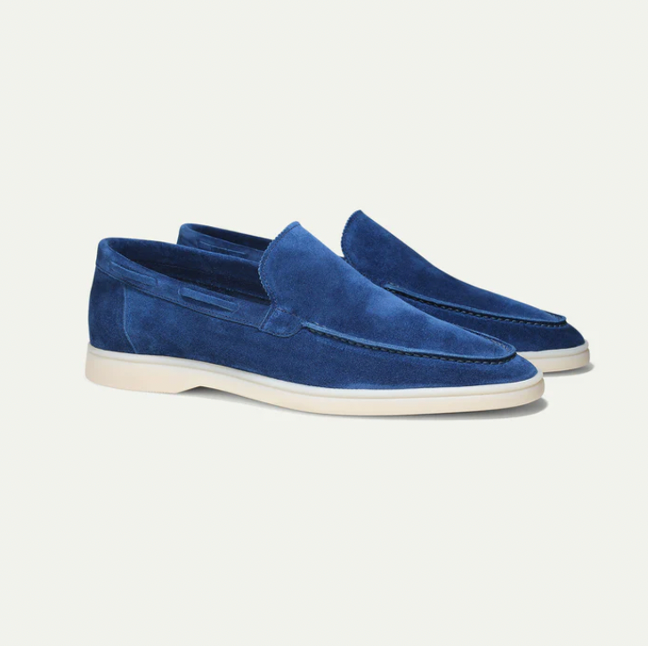 Men's slip-on loafers with moc-toe stitching and flat soles