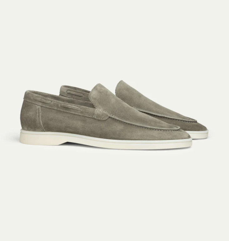 Men's slip-on loafers with moc-toe stitching and flat soles