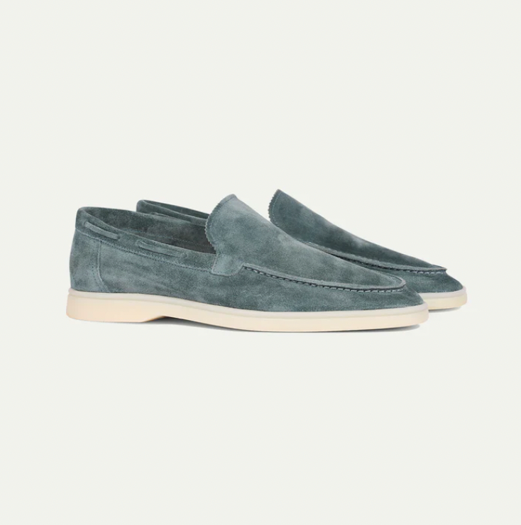 Men's slip-on loafers with moc-toe stitching and flat soles