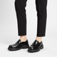 Unisex polished loafers with wide vamp straps and chunky lug soles