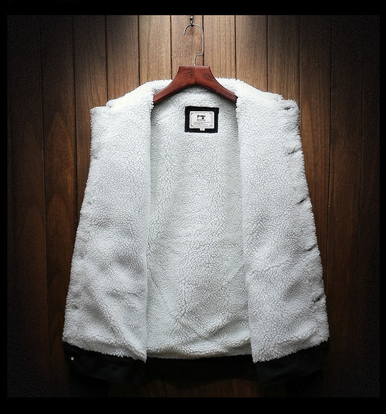 Sherpa-lined denim jacket with button front, chest pockets and long sleeves