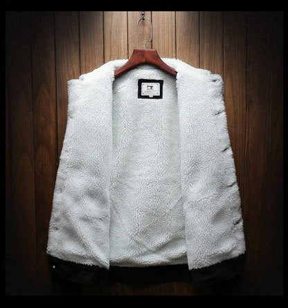 Sherpa-lined denim jacket with button front, chest pockets and long sleeves