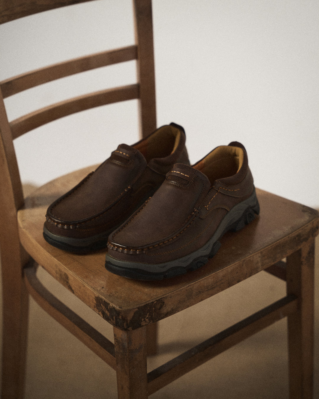 Men's moc toe loafers with contrast stitching and chunky lug soles