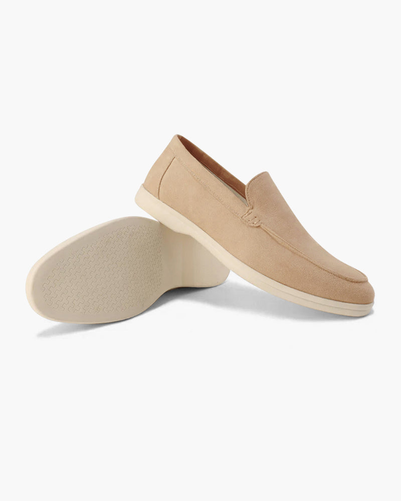 Slip-on loafers with almond toes, moc stitching and raised wedge soles