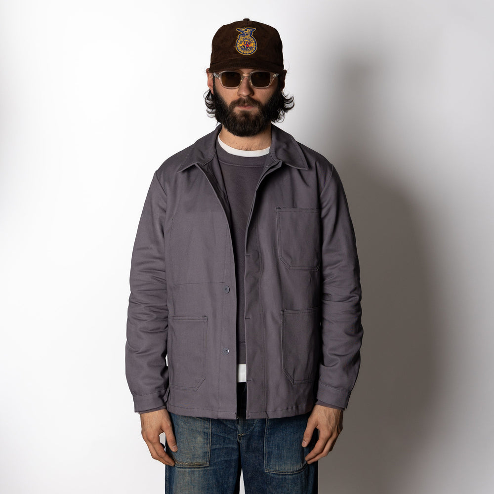 Men's gray utility jacket with collar and multiple patch pockets