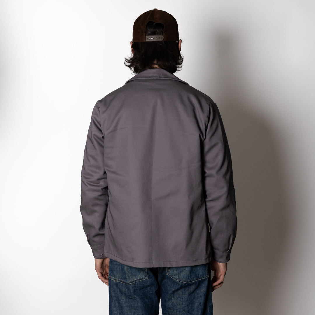 Men's gray utility jacket with collar and multiple patch pockets