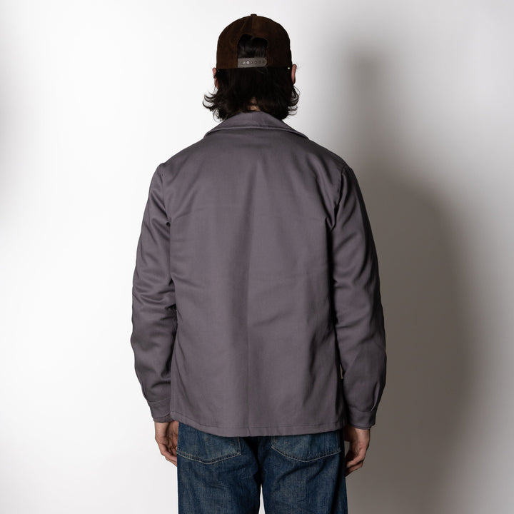 Men's gray utility jacket with collar and multiple patch pockets