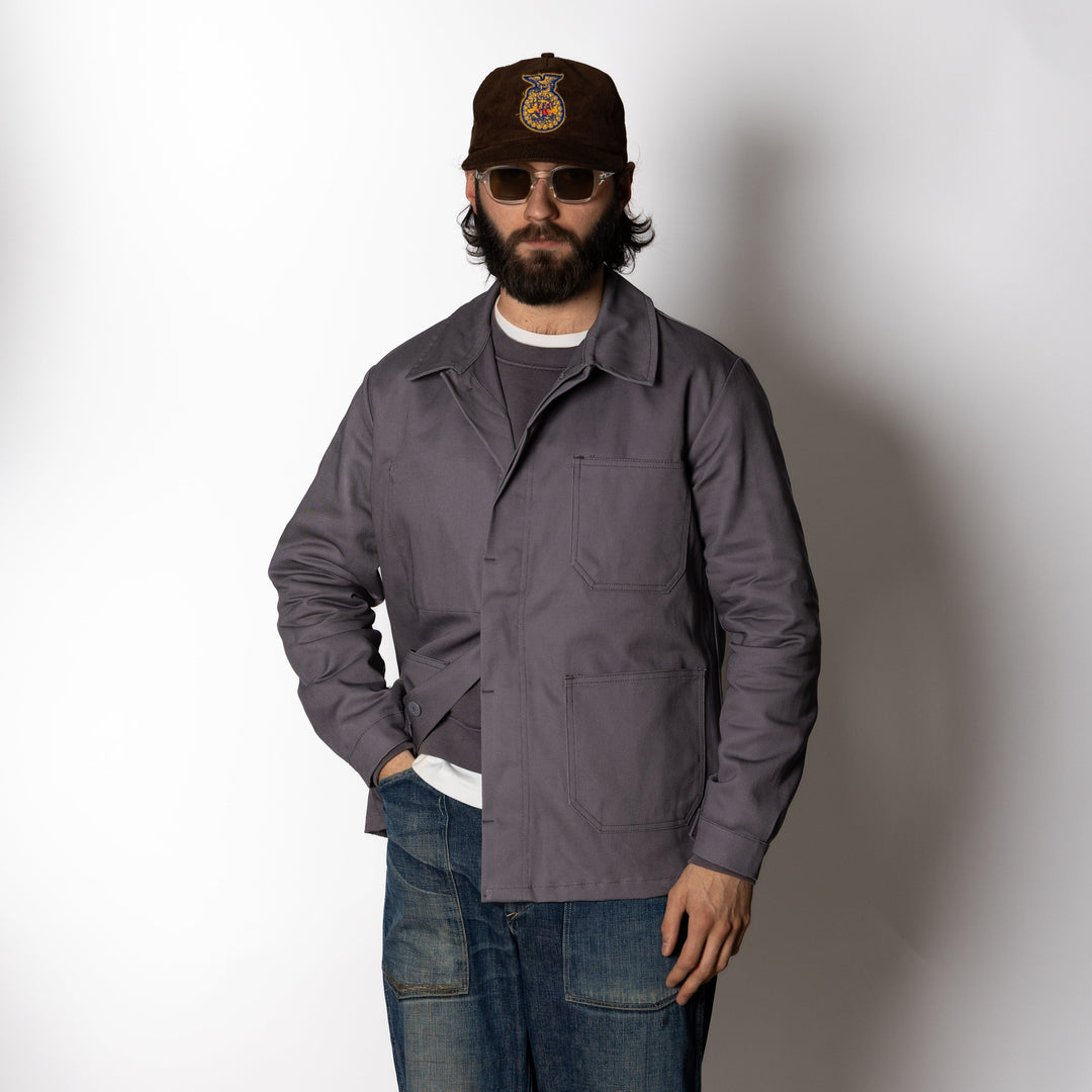 Men's gray utility jacket with collar and multiple patch pockets